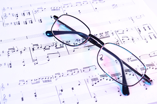 Glasses on sheet music.(Sonate for Violin and Piano K 379. W.A.Mozart)