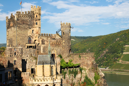 Rheinstein castle in the hills above river Rhine