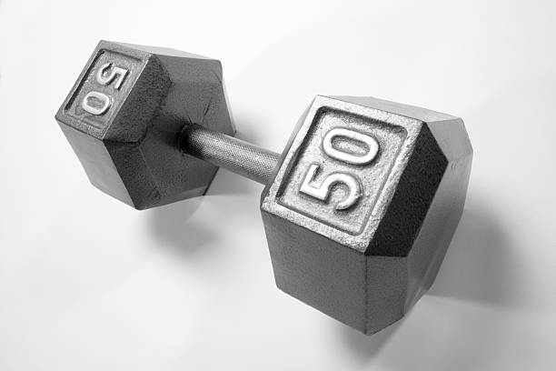 istock Heavy 50 lbs Barbell on white background 183045279