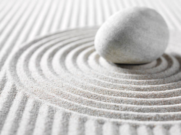 istock One Zen Stone in a Rock Garden 183045440