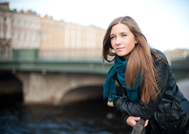 istock Pensive girl on the quay 183045460