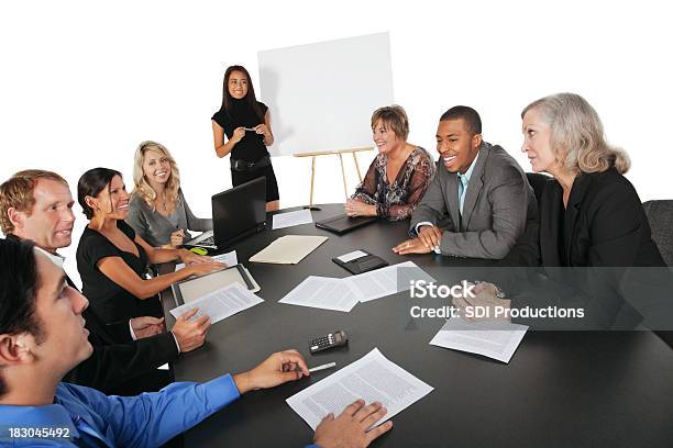 Businesswoman Sharing Presentation At A Business Meeting Stock Photo - Download Image Now