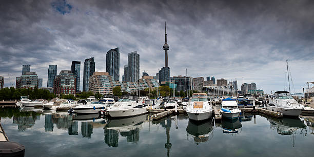 istock Dark storm clouds over marina in Toronto 183045644