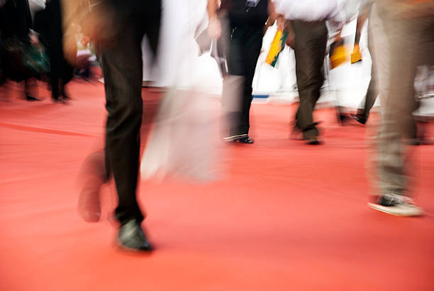 istock Pedestrians walking on a red carpet 183045823