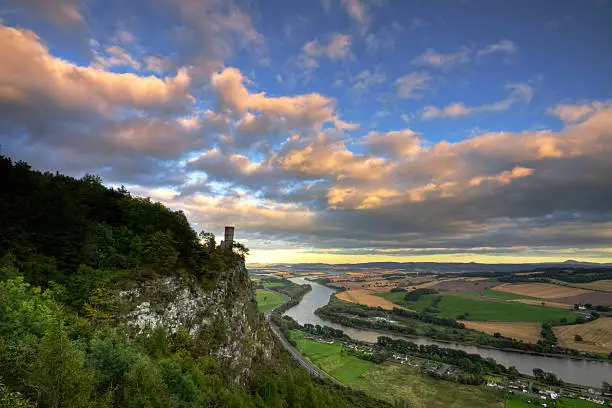 Photo of Kinnoul Tower overlooking Perthshire landscape in evening light.