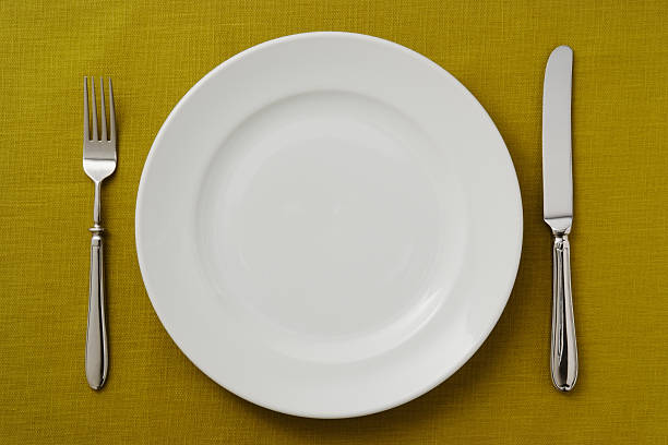 istock Overhead shot off place setting on green tablecloth 183046061