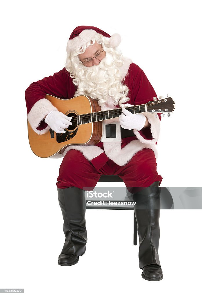 Santa Claus Playing Axoustic Guitar - Music Series Santa Claus playing a folk guitar. Isolated on white.Click below to see a lightbox of all my Santa images: Arts Culture and Entertainment Stock Photo