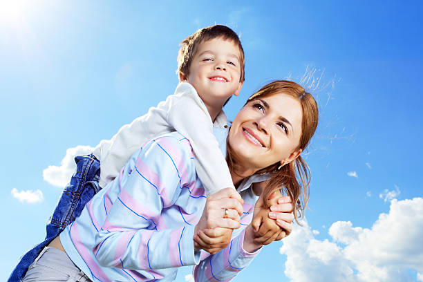istock Mother and son playing together outdoor. 183046439