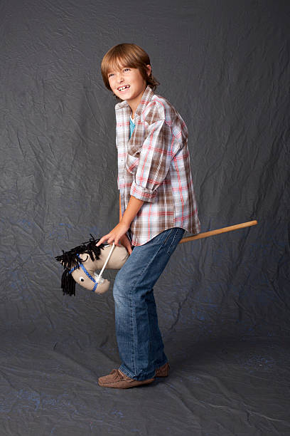 istock Kid Playing on Toy Horse 183046957