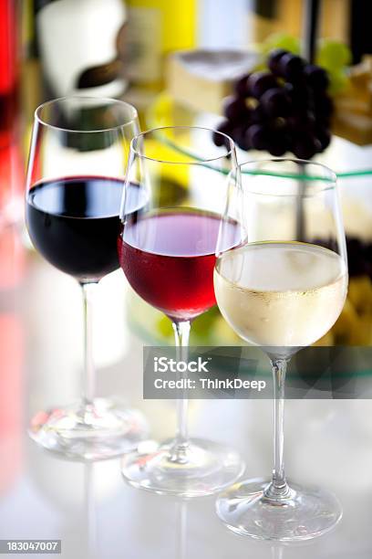Cheese Grapes And 3 Glasses Of Wine In Different Colors Stock Photo - Download Image Now