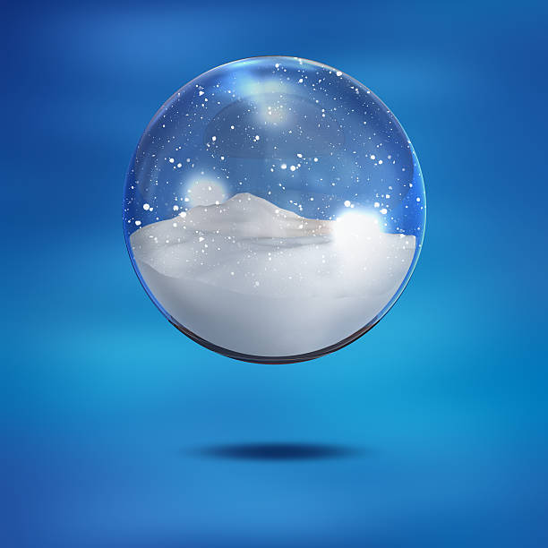 Snow globe Snow globe on blue background. snow globe photos stock pictures, royalty-free photos & images