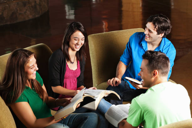 istock Group of Friends Laughing Together While Discussing Bible Study 183047144