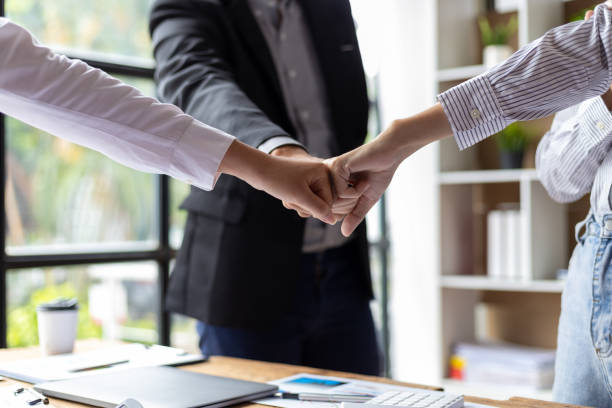 istock Collaboration and unity of people in an organization. 1830471805