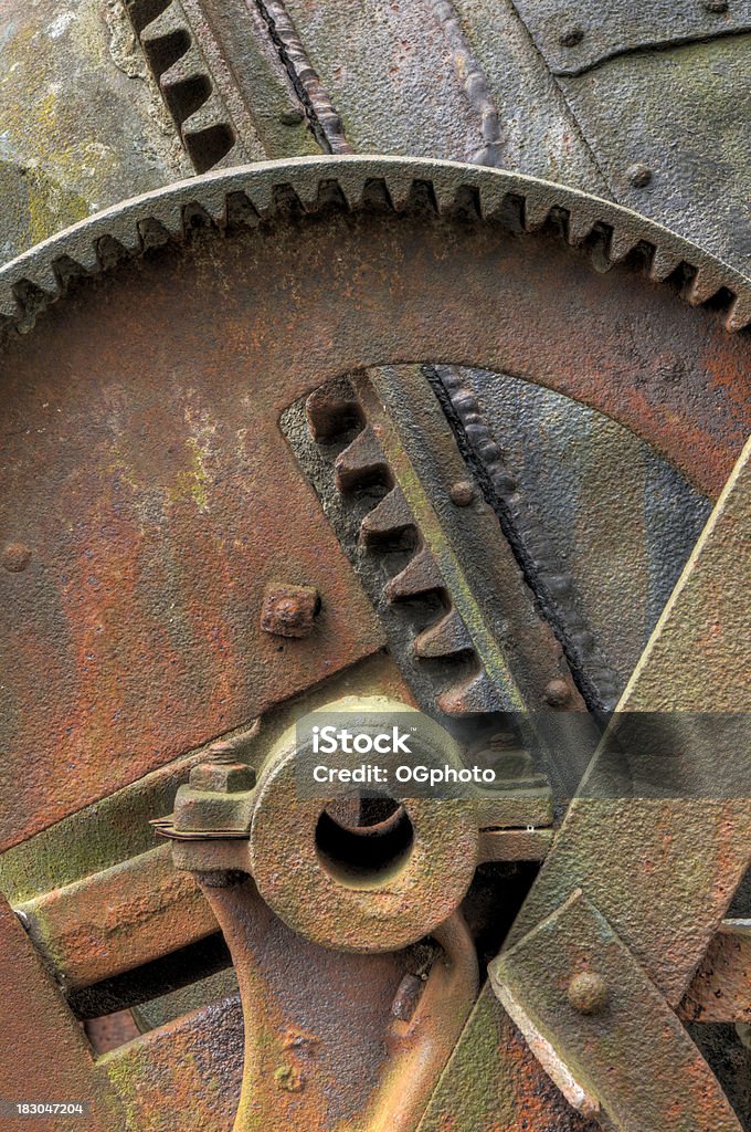 Rusted gears of an old machine Rusted and weathered gears of an old abandoned machine. Abandoned Stock Photo