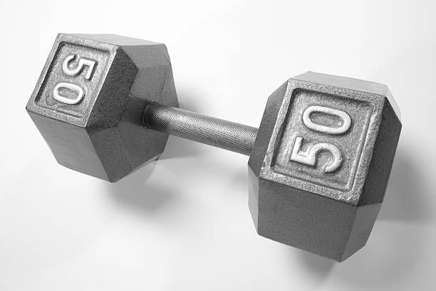 istock Heavy 50 lbs Barbell on white background 183047291