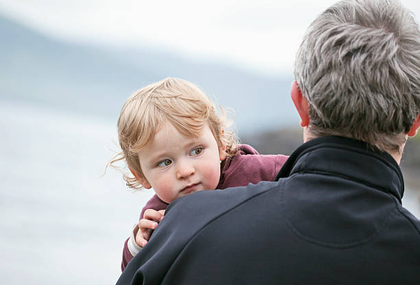 istock Man and small baby outdoor 183047322