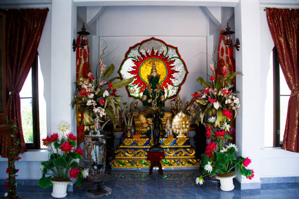 istock Hindu god Indra or Deva or Aditya deities green jade statue for thai people and foreign traveler travel visit and respect praying holy myth mystery at Wat Khao Sanam Chaeng Temple in Lopburi, Thailand 1830473968