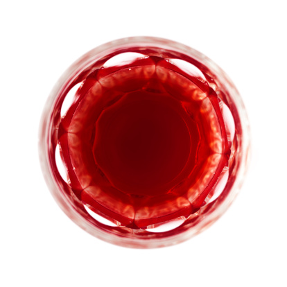 Elevated view of a Greek traditional glass of rose wine isolated on white.Related picture:
