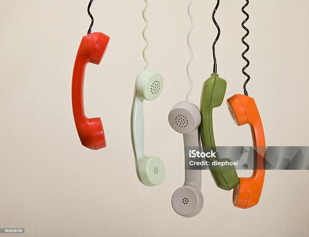 resting talks "five colorful handset hanging in a row," Retro Style Stock Photo