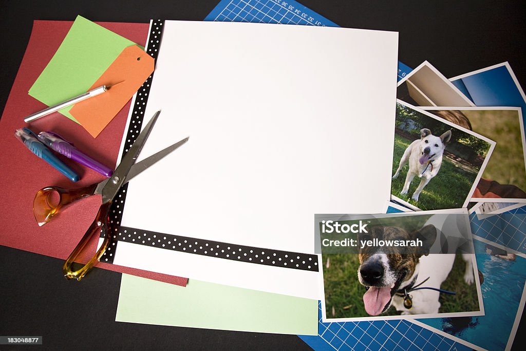 Scrapbooking Dog Layout Scrapbooking items and photographs layed out on black card (not isolated). All photographs are taken and owned by me. Photo Album Stock Photo