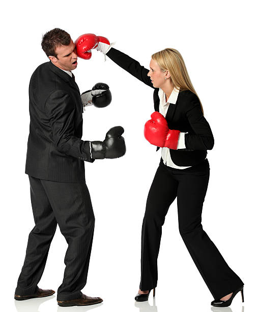 istock Business executives fighting in boxing gloves 183048903