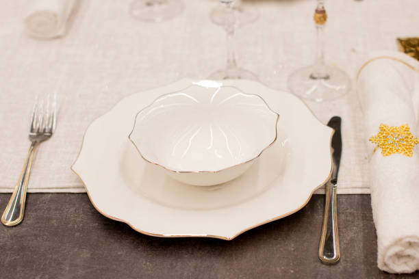 istock New Year's table setting. Glass festive tableware, Christmas 1830494982