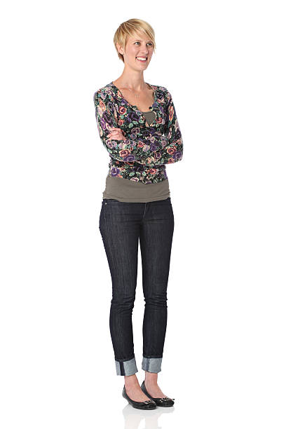 istock Happy woman standing with arms crossed 183049512