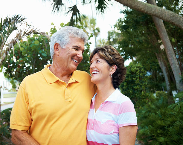 istock Senior couple looking at each other and smiling 183049767