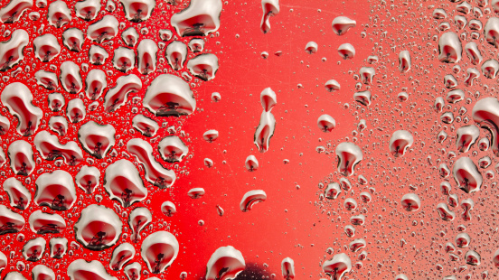 Condensation on  Drinking glass - glass bottle. Ice Cold Coca cola glass With Water Drops