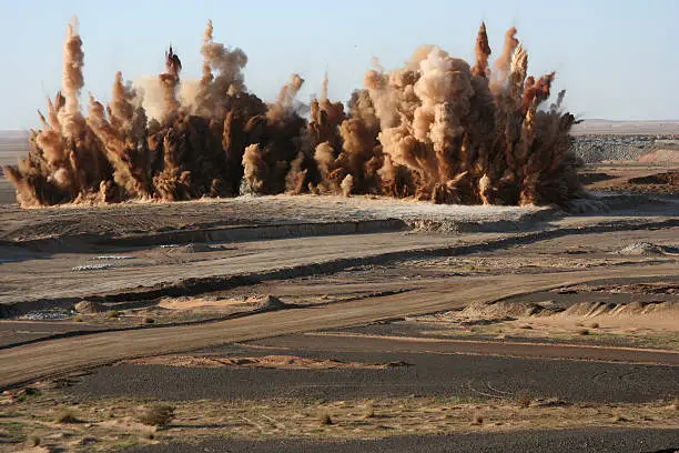 Surface blast on a gold mine in the Sahara Desert.
