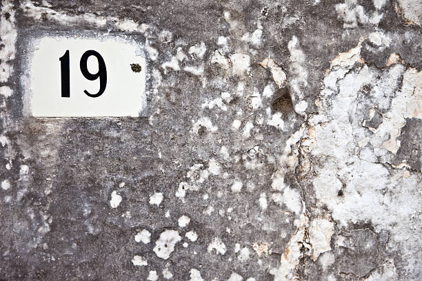 istock 19, Street Number On The Wall 183050805