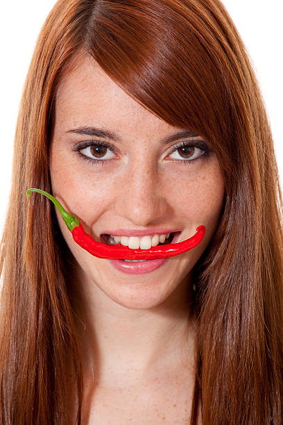 istock Woman with red hot chili pepper 183050816