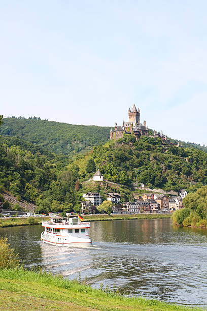 istock Excursion boat on river Mosel with Reichsburg castle in background 183051042