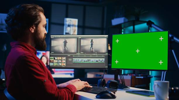 istock Expert color correcting clips on isolated screen PC to ensure project meets desired aesthetic 1830510608