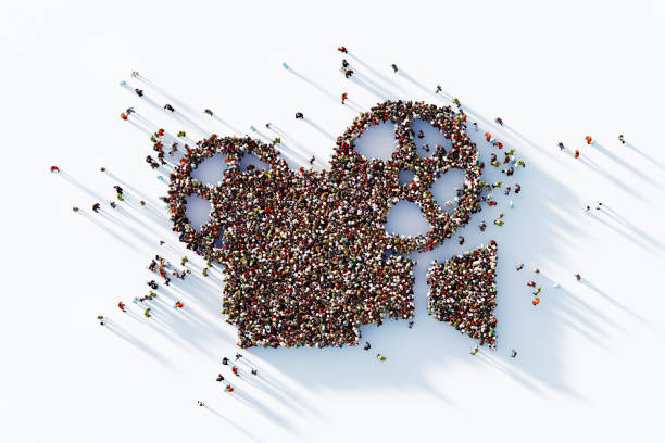 istock Human Crowd Forming Movie Camera Symbol On White Background 1830513344