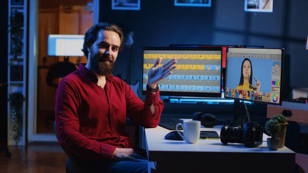 istock Photographer filming content, discussing about software used to perform image editing 1830519354
