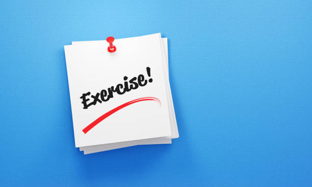 istock Exercise Written Post It Notes Pinned By A Red Thumbtack On Blue Background 1830520670