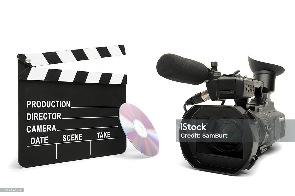 HD Film Making "A royalty free stock photo of a clapperboard, HD camera and a DVD disc isolated on white." Arts Culture and Entertainment Stock Photo