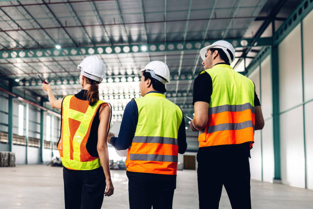 istock Warehouse worker working in warehouse storage. Foreman or worker work at factory site check up products in site. Inventory worker working in  factory Storehouse 1830532306