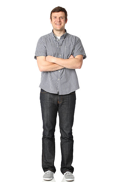 istock Happy man standing with arms crossed 183053431