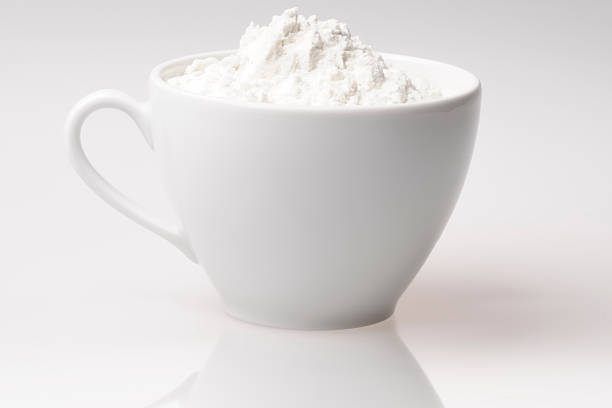 Cup of flour stock photo