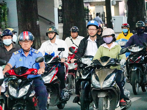 Ho Chi Minh City, Vietnam- September 10, 2018: Heavy scooter traffic on a Ho Chi Minh City street.