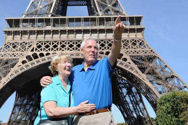 istock Senior couple in front of Eiffel Tower 183054393