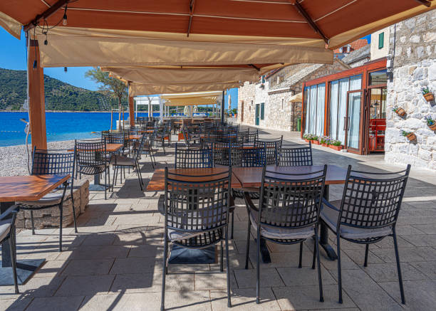istock The interior of an open-air restaurant on the seashore. 1830546241