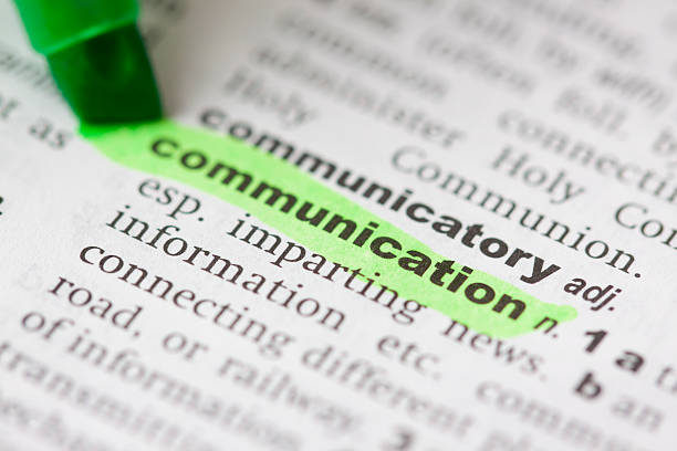 Highlighted communication in dictionary stock photo