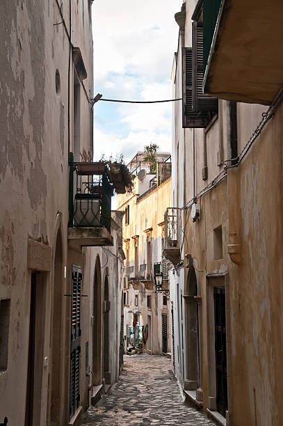 istock narrow street in Otranto, Italy 183055580