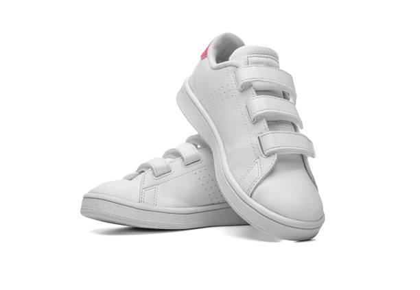 istock White sports shoes on a white. 1830556457
