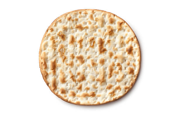 Bread: Matzo Isolated on White Background More Crackers here... matzo stock pictures, royalty-free photos & images