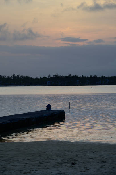 istock Blue Bay Beach in Mauritius at Dusk 1830557338