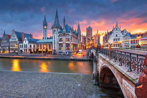 Ghent, Belgium old town cityscape from the Graslei at dawn.